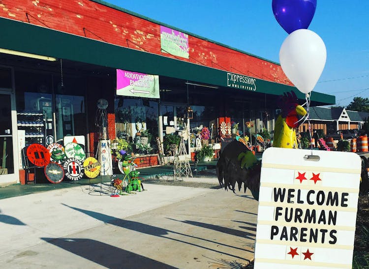 Welcome Furman Parents, reads the sign outside our Greenville storefront